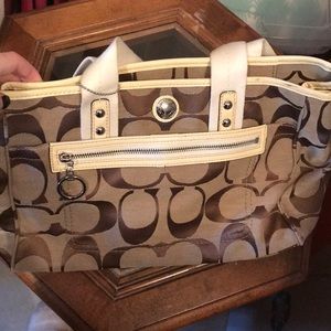 Coach medium sized brown and white signature bag